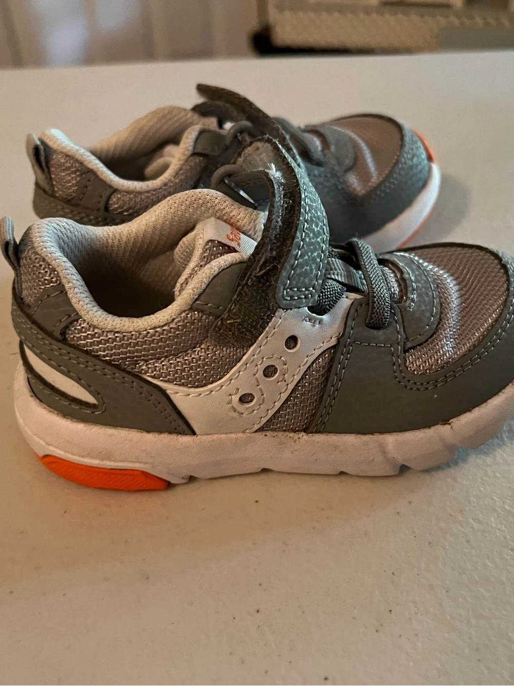 Saucony Kids Grey and White Athletic Sneakers with Orange Accent